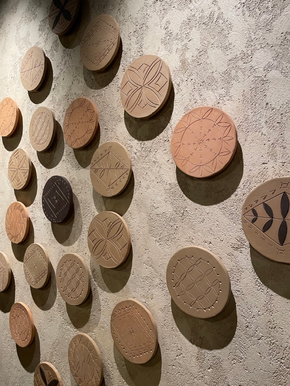 Hand-carved Sāmoan ceramic installation at Metita, Sky City