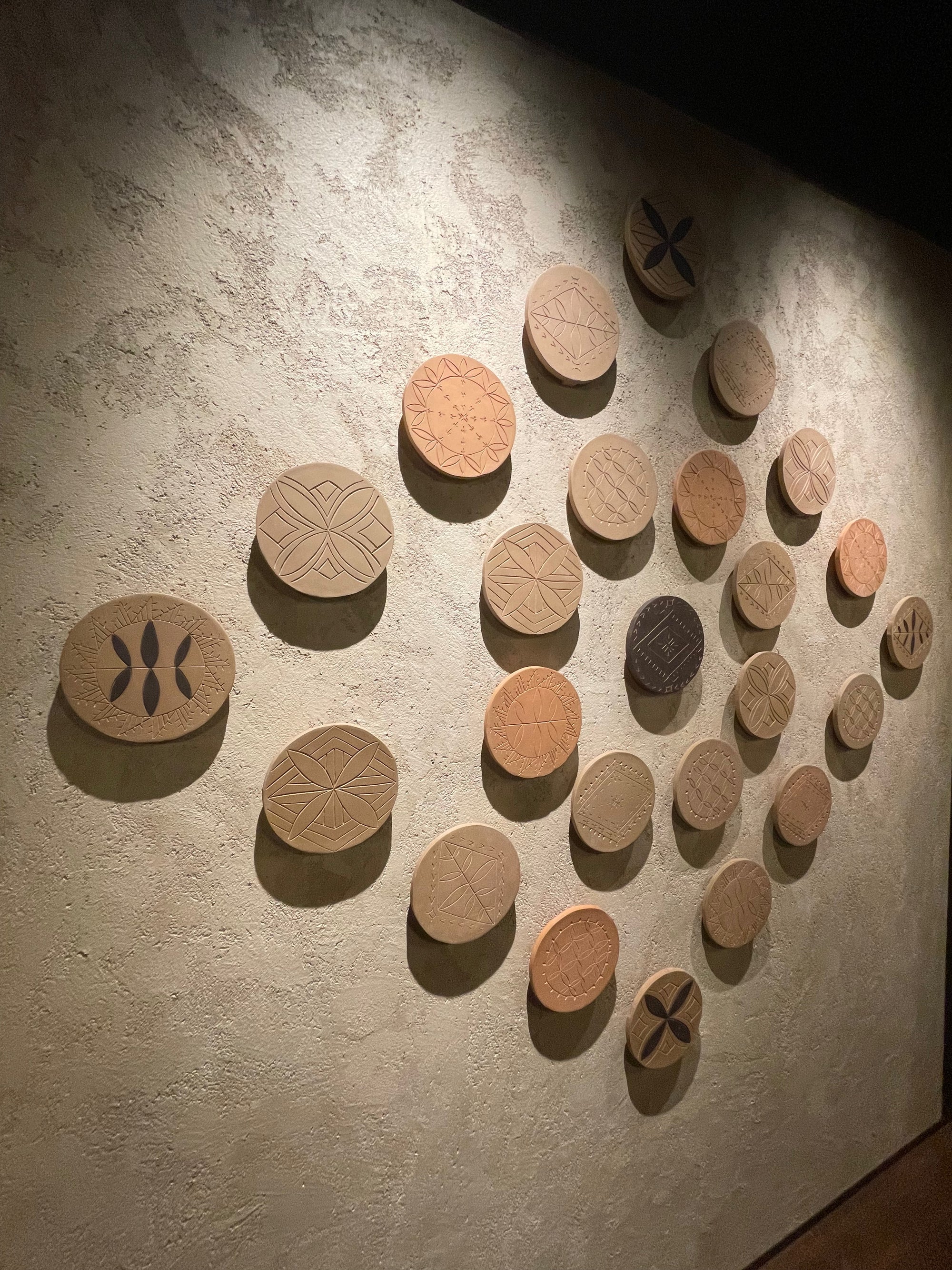 Hand-carved Sāmoan ceramic installation at Metita, Sky City