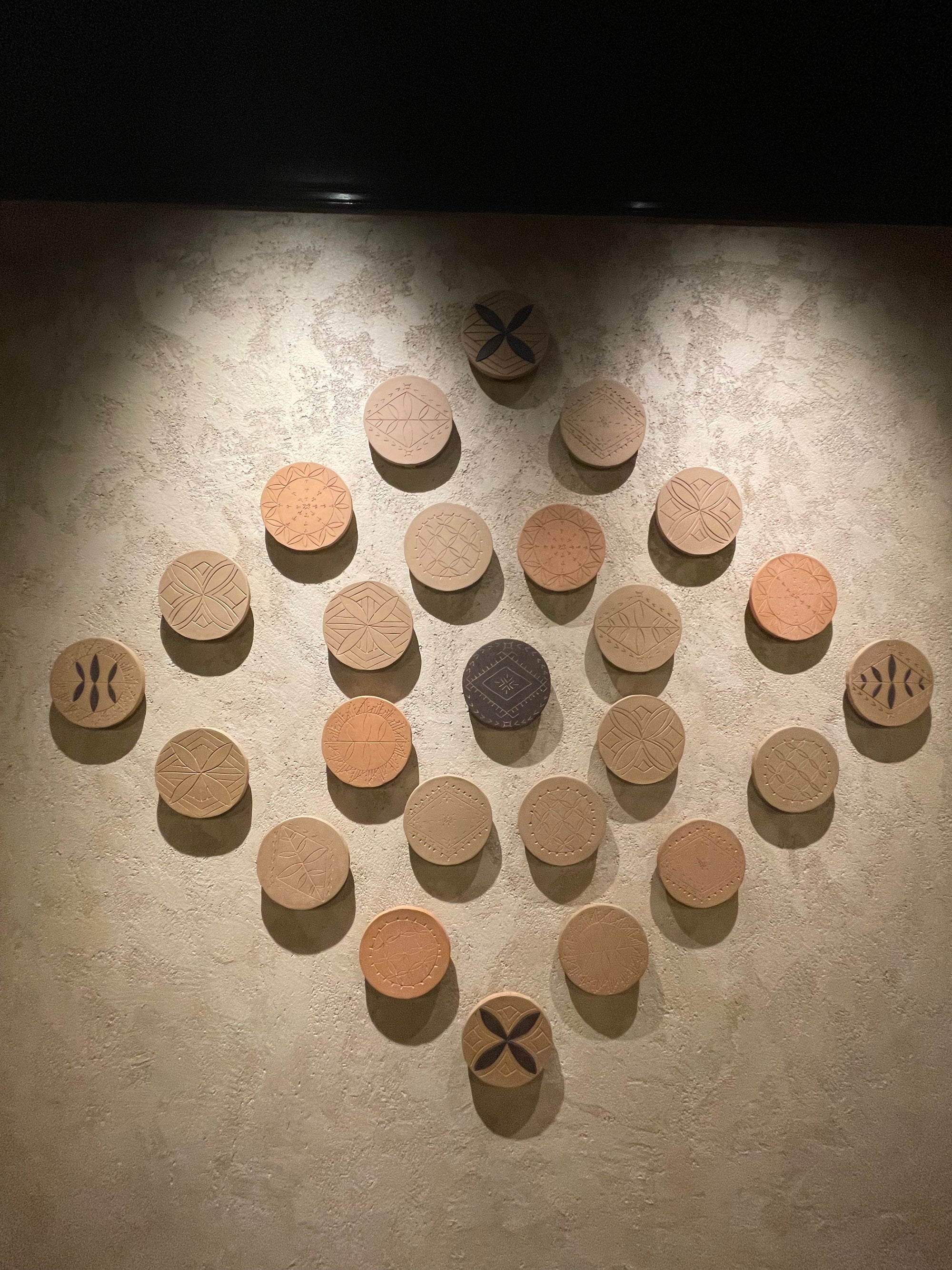 Hand-carved Sāmoan ceramic installation at Metita, Sky City