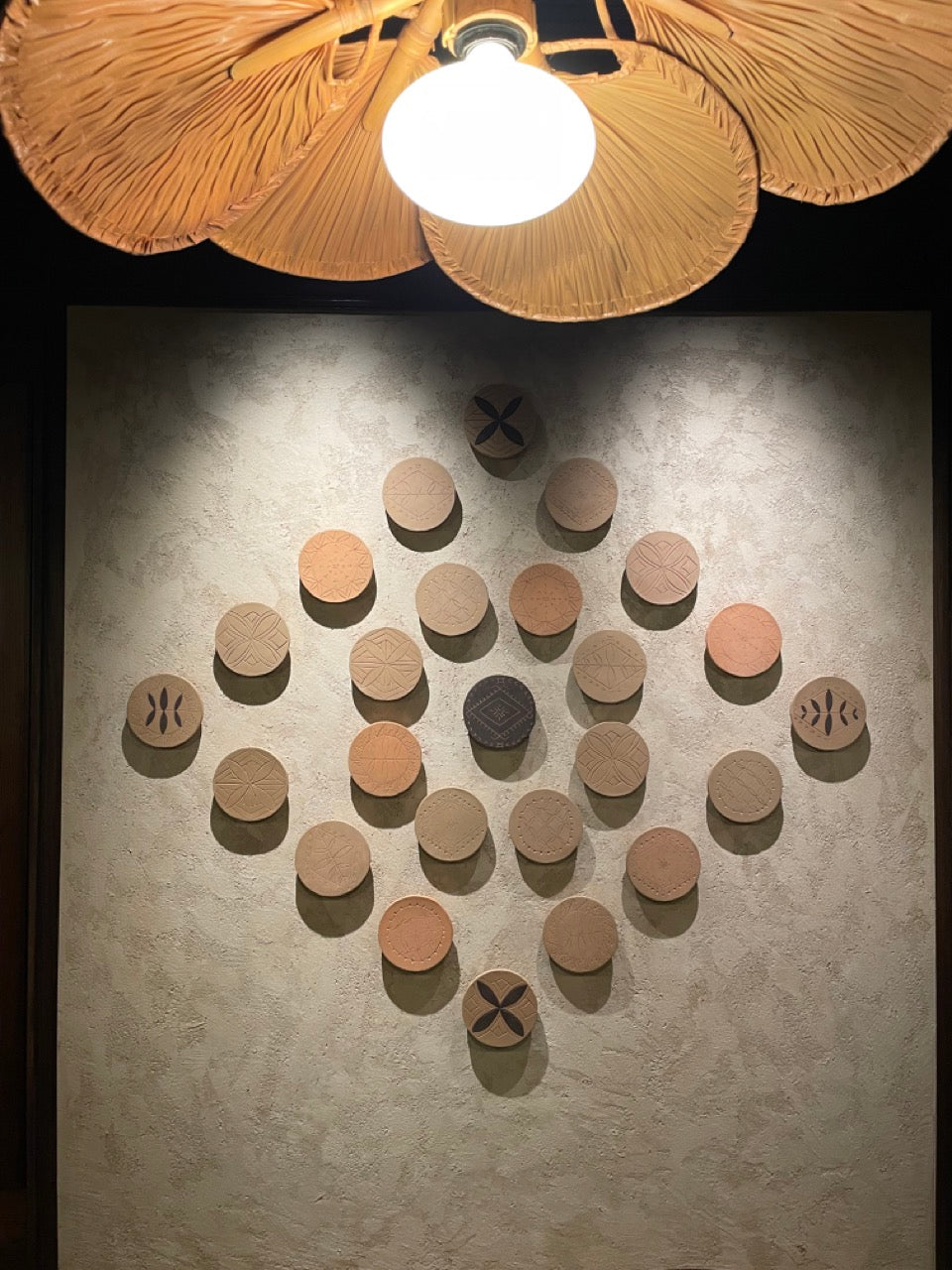 Hand-carved Sāmoan ceramic installation at Metita, Sky City