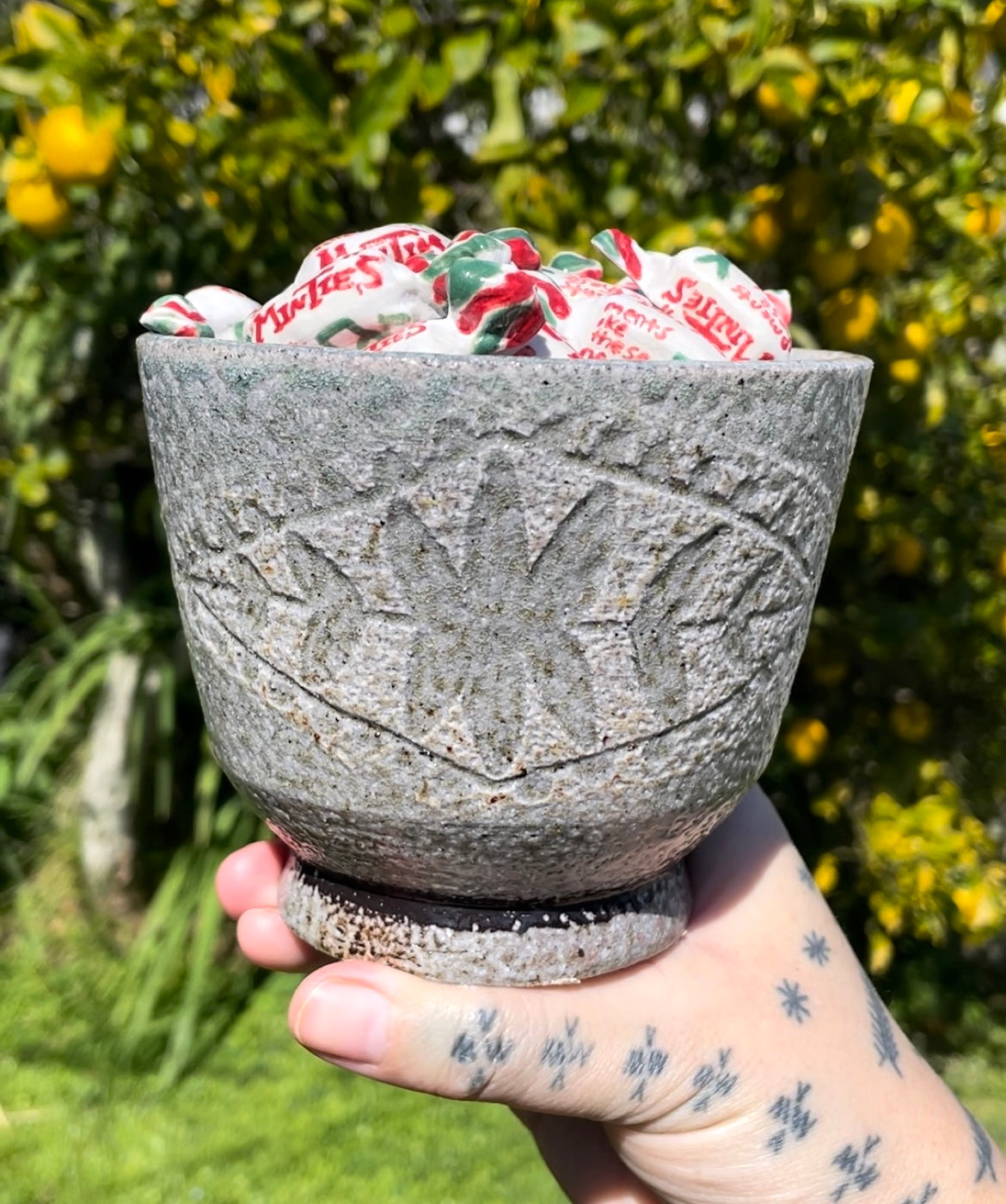 Earlier hand-carved ceramic work